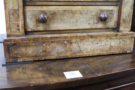 A Victorian cross-banded walnut Wellington chest of small proportions, fitted six drawers, (top a.f.) H.60cm
